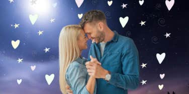 man and woman smiling at each other