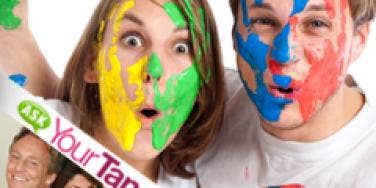 man and woman covered in paint