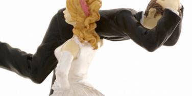 bride carrying groom