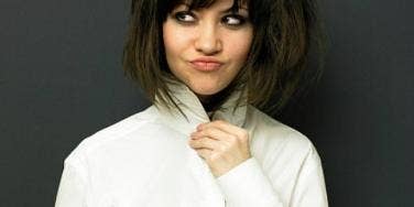 woman buttoned up white shirt