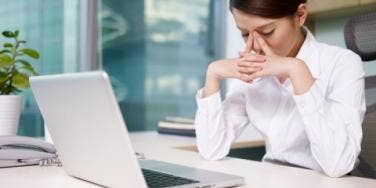 woman looking at computer