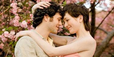 couple with cherry blossoms