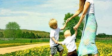 mother playing with her kids.