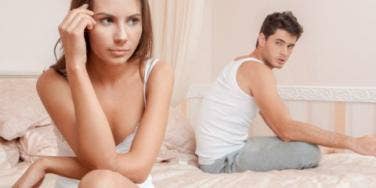 unhappy couple in bedroom