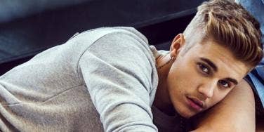 Justin Bieber Justin Bieber wearing a long sleeved gray tee