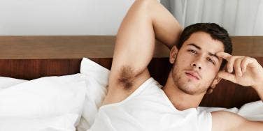 Nick Jonas in bed talking about losing his virginity having sex for the first time