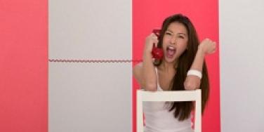Woman yelling on phone