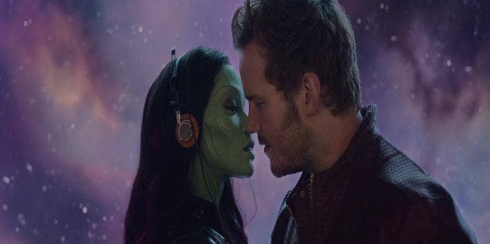Zoe Saldana as Gamora and Chris Pratt as Star Lord of the Marvel "Guardians Of The Galaxy" movie, about to kiss and consummate their romance