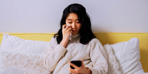 woman crying on phone