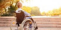 woman in a wheelchair outside