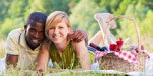 couple lying in the grass 