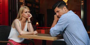 man and woman on bad date