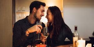 man and woman eating dinner at home