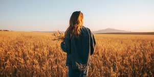 woman alone in field