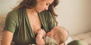 woman breastfeeding baby