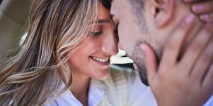 woman and man embracing