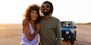 man and woman smiling