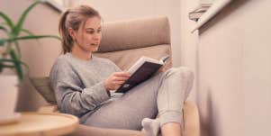 woman reading book