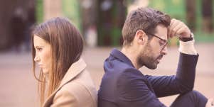 couple looking away from each other