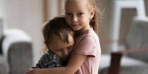 girl hugging boy