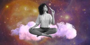 woman blowing out candle flame sitting on cloud