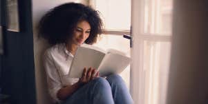 woman reading book