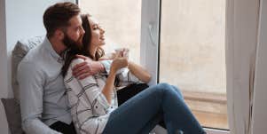 couple sitting by window