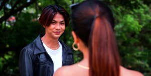 shy man talking to woman