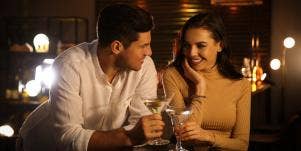 man and woman flirting