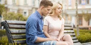 couple sitting on bench