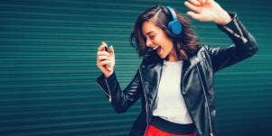 woman dancing to feel good songs