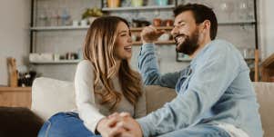 couple talking on couch