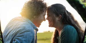 man and woman smiling at each other