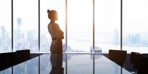 Woman standing in front of window