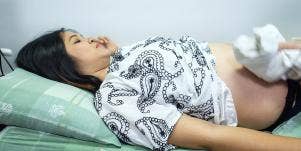 woman lying on bed