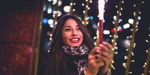 woman holding sparkler