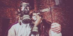 couple wearing gas masks