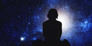 woman sitting watching stars
