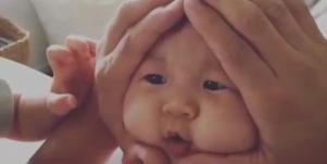 Parents Are Squishing Baby's Faces To Look Like Rice Balls