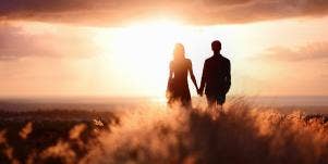 man and woman holding hands