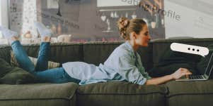 Woman laying on couch creating her online dating profile 