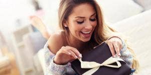 woman opening gift