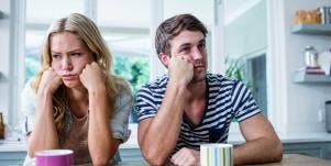 annoyed couple ignoring each other