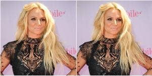Britney Spears posing in black lace dress on step & repeat
