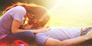 couple kissing outside