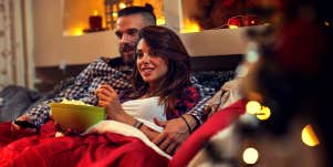 couple watching Christmas movies together 
