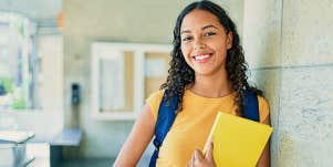 Content college student in yellow