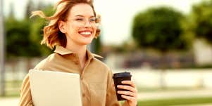 Confident woman walking to work