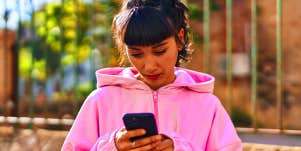woman texting on phone