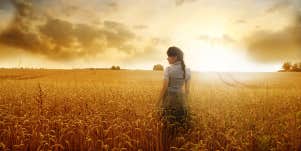 woman in a field of wheat